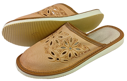 Pair of handmade Polish leather slippers for women with decorative floral perforations and brown leather trim