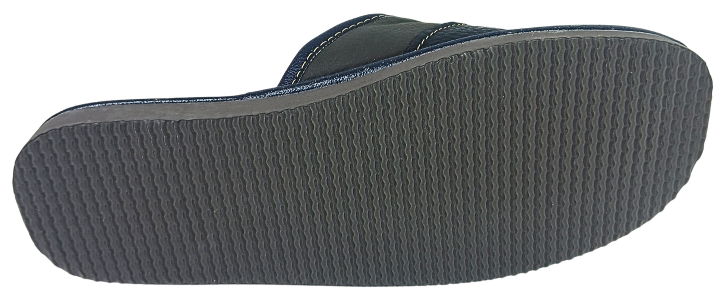 Bottom view of men's handmade leather slipper showing textured rubber EVA sole, flexible and non-slip