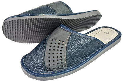 Men's leather slippers pair showing flexible rubber sole and perforated cowhide upper, handmade in Poland