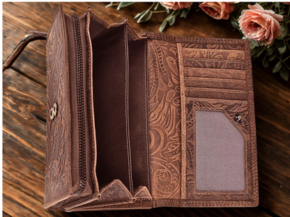 Interior of floral embossed leather purse showing 7 card slots, 3 banknote compartments and zip coin pocket