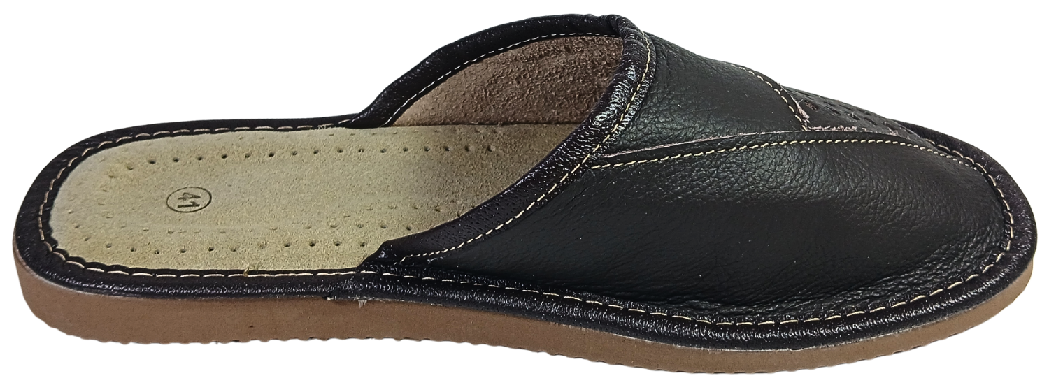  Lifestyle shot of man wearing dark brown closed-toe leather slippers on hardwood floor with grey trousers — The Leather Gift Co