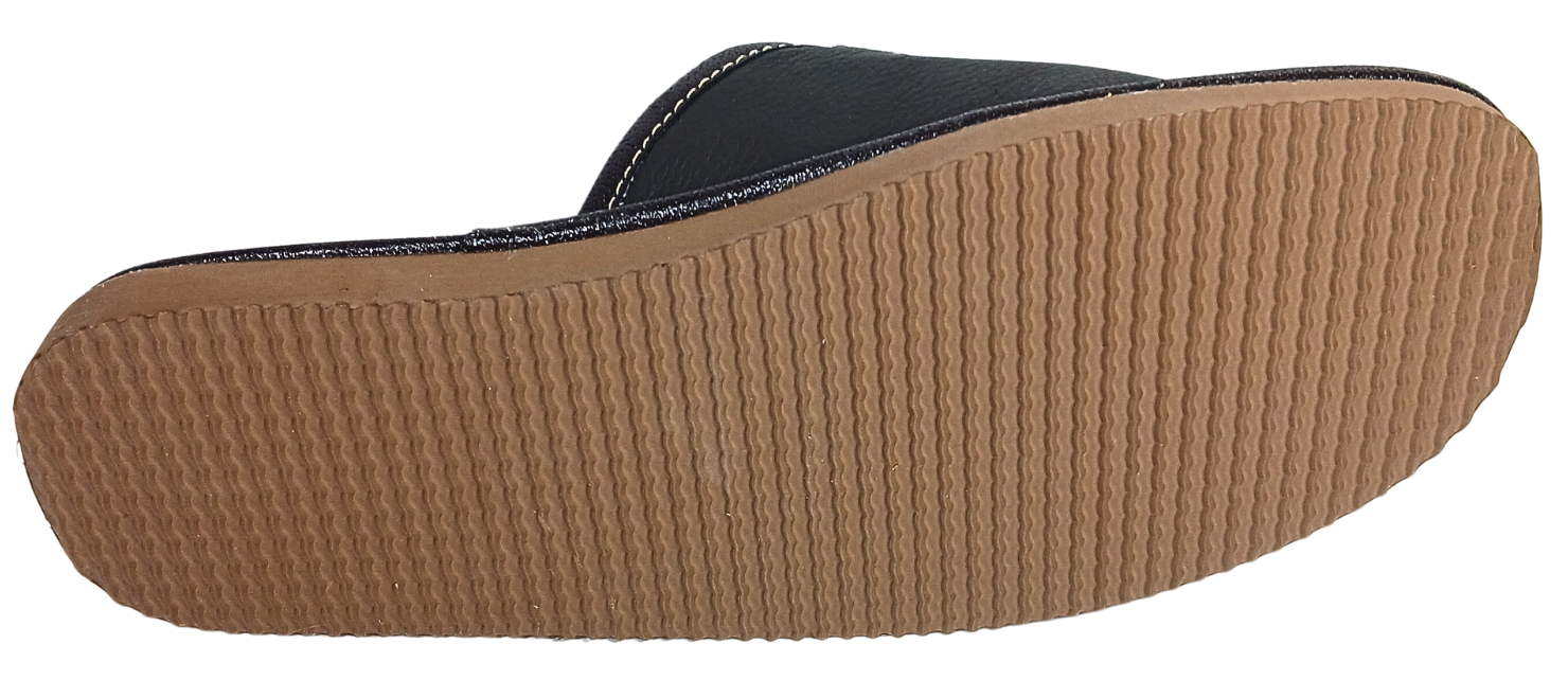 Sole view of men's dark brown leather closed-toe slipper showing full tan ribbed rubber outsole and white contrast stitching — The Leather Gift Co