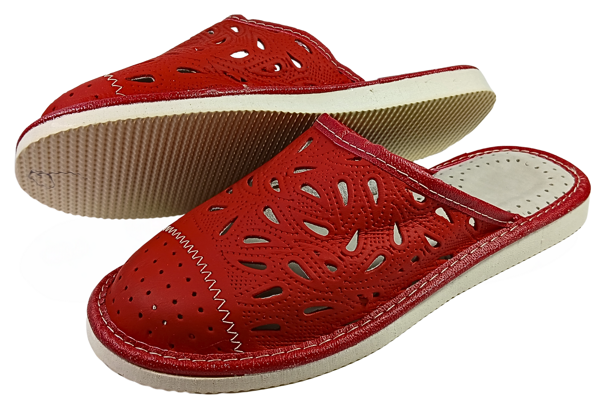 Woman wearing red handmade sheepskin bedroom slippers indoors, cosy home slip-ons - The Leather Gift Co