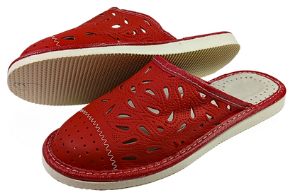 Woman wearing red handmade sheepskin bedroom slippers indoors, cosy home slip-ons - The Leather Gift Co