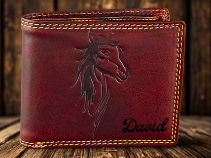 Brown leather wallet with horse embossing and 'David' engraving on a wooden surface.