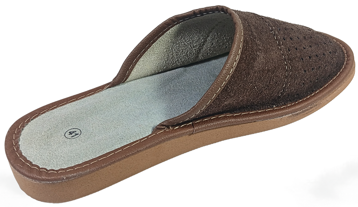 Three-quarter front view of men's dark brown suede closed-toe slipper showing perforated vamp and pale leather footbed — The Leather Gift Co