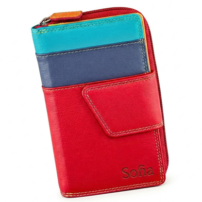 Colorful wallet with blue and red sections on a wooden surface with flowers