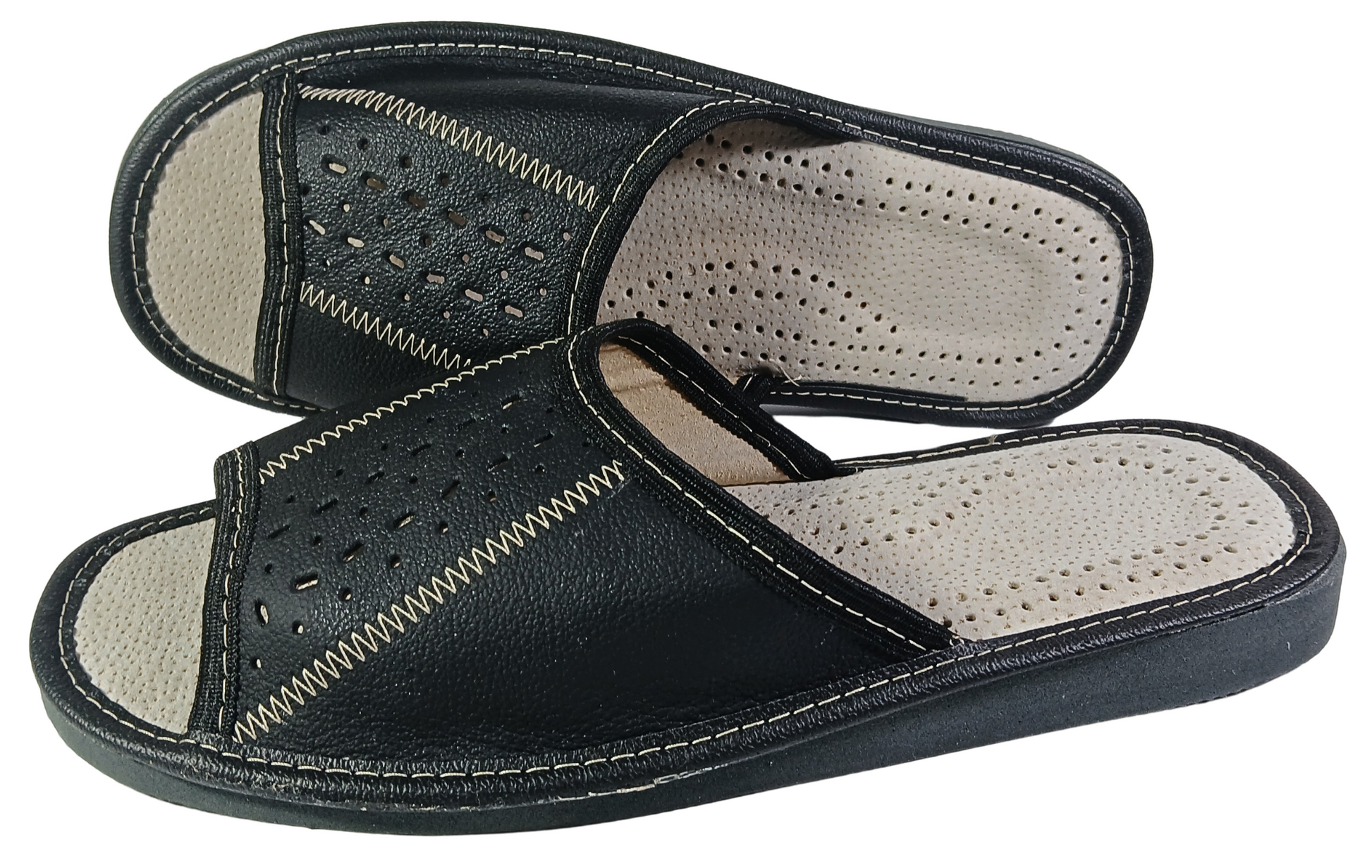 Close-up of sheepskin footbed in men's black leather barefoot house slippers - The Leather Gift Co