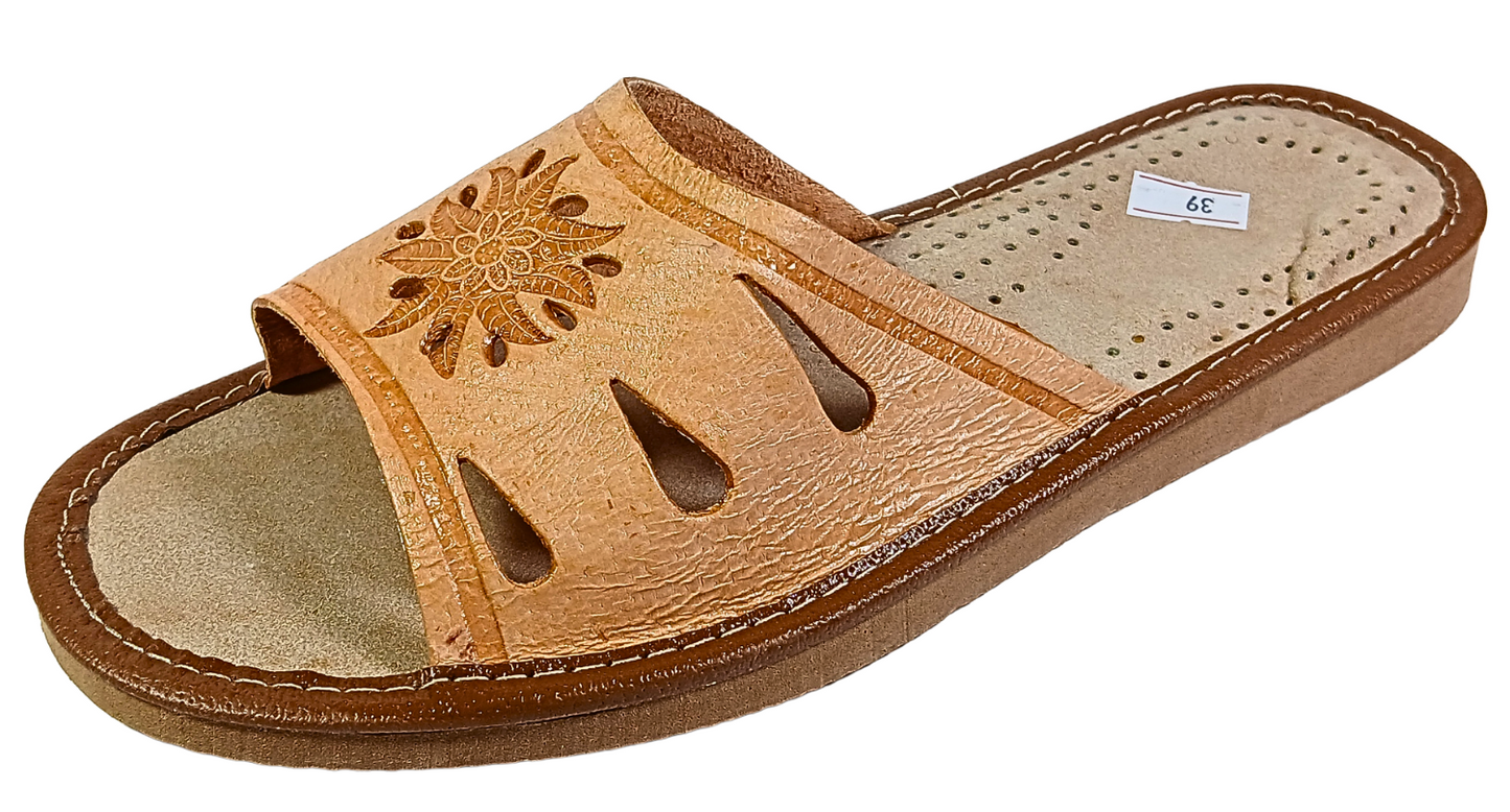 Tan leather open toe slide slipper with floral embossed detail and teardrop cutouts — side view