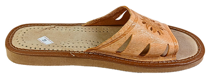 Handmade tan leather slide slipper with floral stamp — top-down view showing perforated sheepskin insole