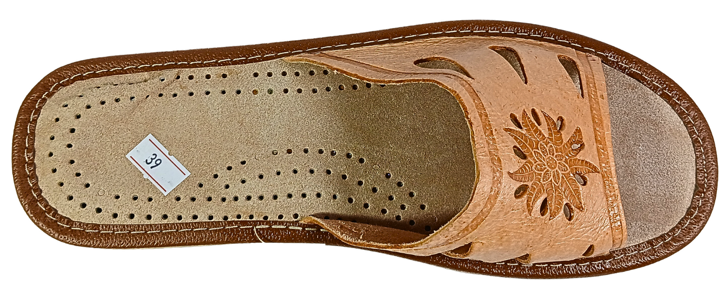Women's tan leather house slide — back heel view showing stitching and outsole thickness