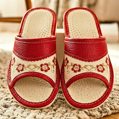 Red leather open toe house slipper — top-down view showing perforated sheepskin insole
