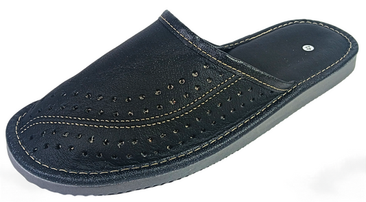 Three-quarter rear view of men's black buffalo leather closed-toe mule slipper showing tan leather insole, white stitching and grey ribbed rubber outsole — The Leather Gift Co