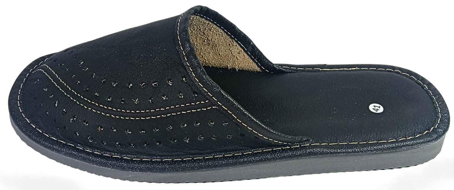 Side profile view of men's black buffalo leather closed-toe mule slipper with perforated dot vamp, white contrast stitching and tan leather insole — The Leather Gift Co