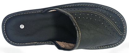 Top-down view of men's black buffalo leather closed-toe mule slipper showing full dual-zone perforated dot upper and white contrast stitching — The Leather Gift Co